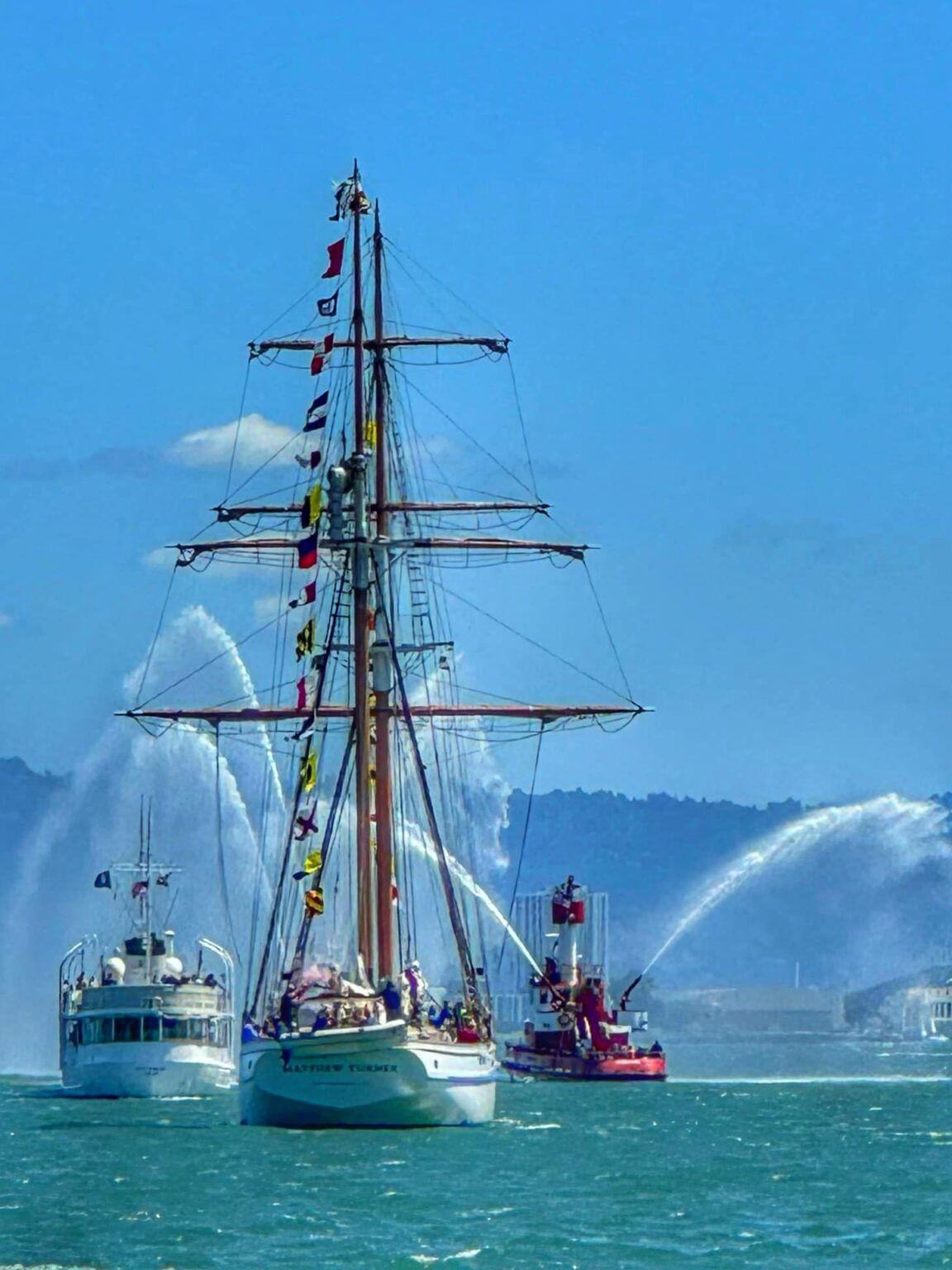 Boats and Crews Dress Up for Opening Day on the Bay